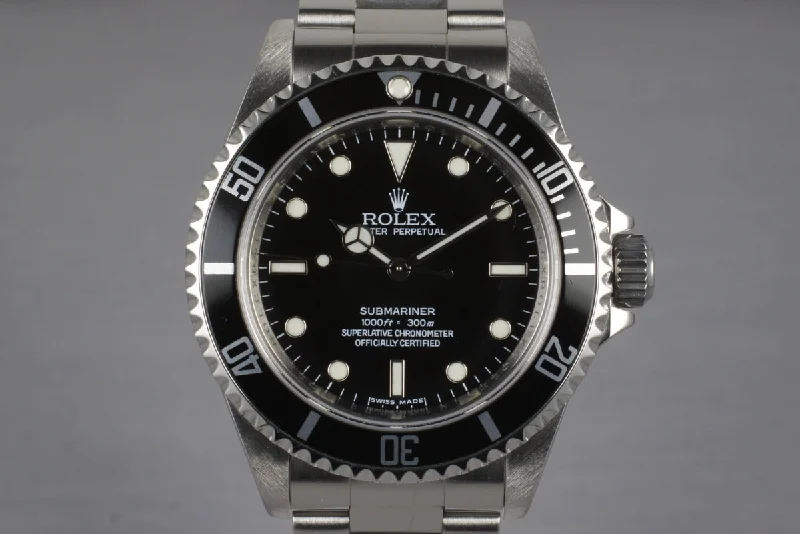 Best men’s watches with dual time zone displays for travelers and frequent flyers-2007 Rolex Submariner 14060M with 4 Line Dial