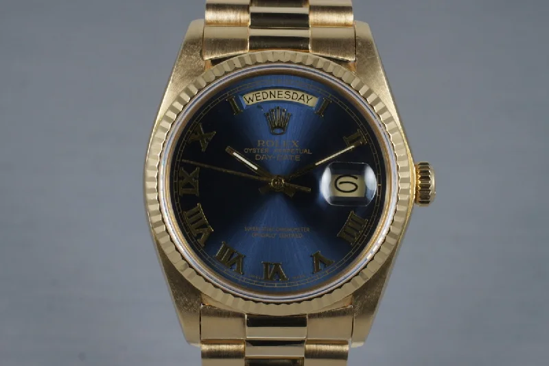 Best men’s watches with luminous hands and markers for easy reading in low light-1987 Rolex YG Day-Date 18038 with Blue Roman Numeral Dial