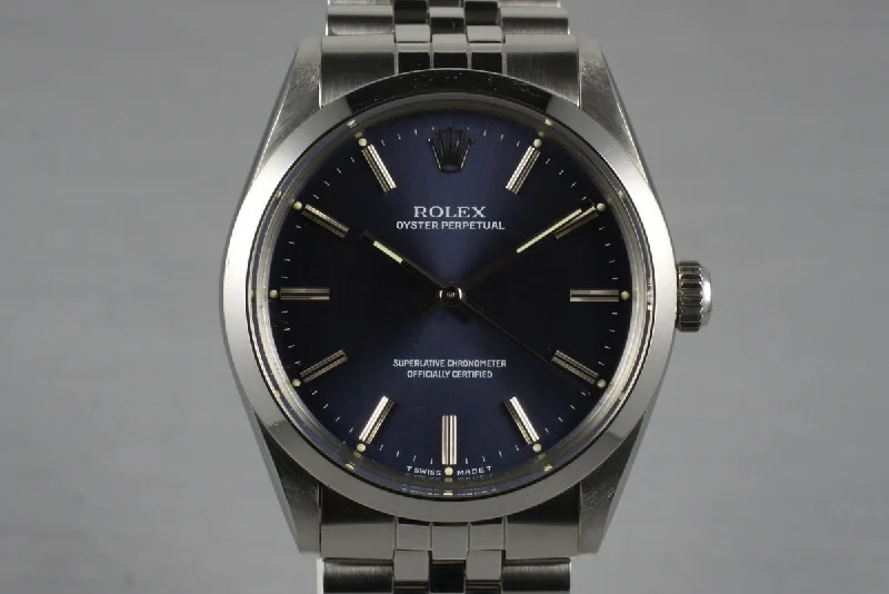 Men’s watches with sporty designs and silicone straps for comfort and performance-1988 Rolex Oyster Perpetual Blue Dial 1002 with RSC Papers