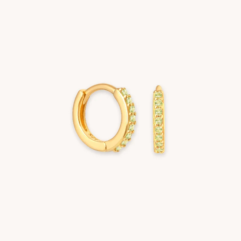 Hoop earrings with circle designs for a classic and timeless shape-August Birthstone Huggies in Gold with Peridot CZ