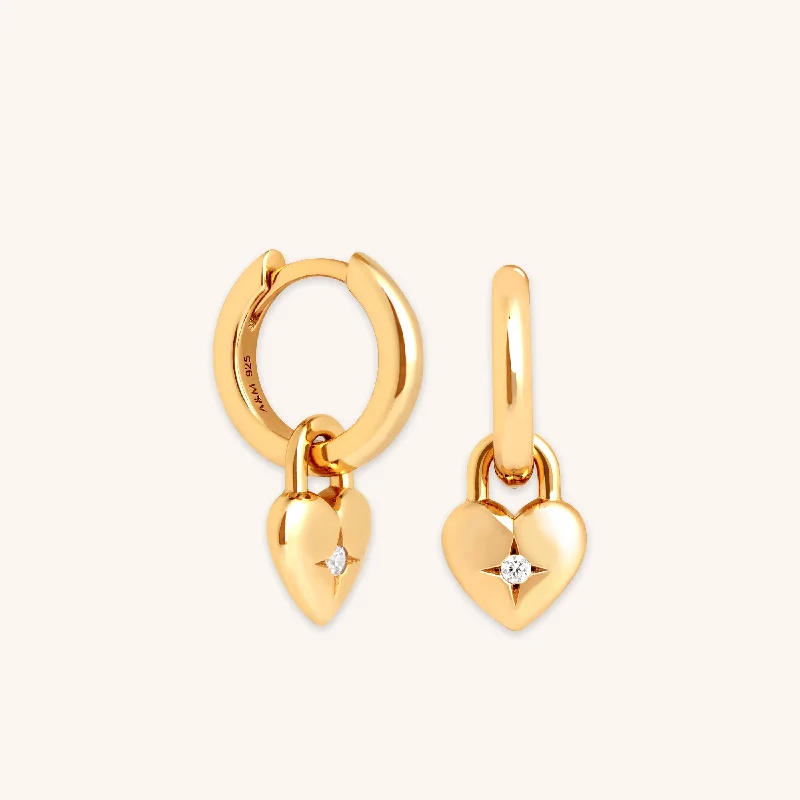 Best hoop earrings with matching bracelets for a coordinated jewelry set-Heart Charm Huggies in Gold