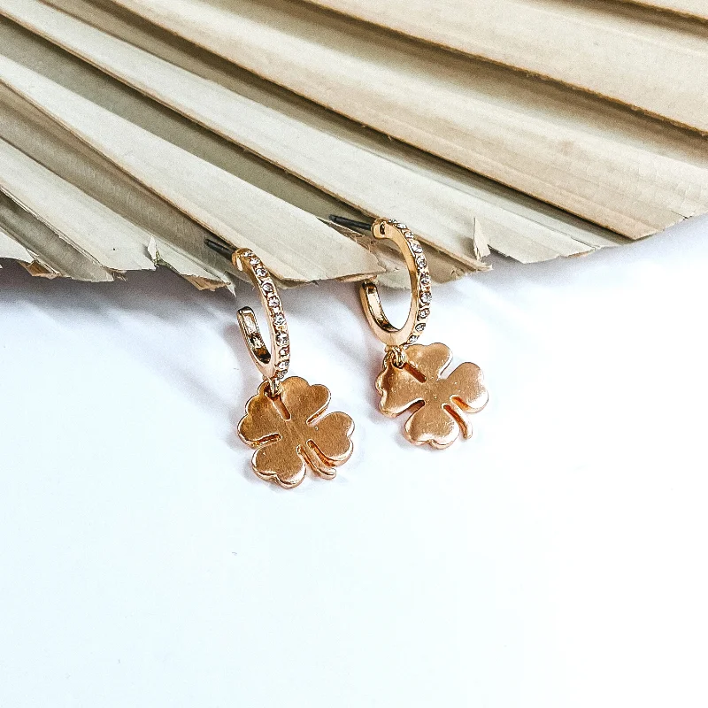 Hoop earrings with braided patterns for a detailed and textured finish-Small Crystal Hoop Earrings with Hanging Four Leaf Clover Charm in Gold Tone